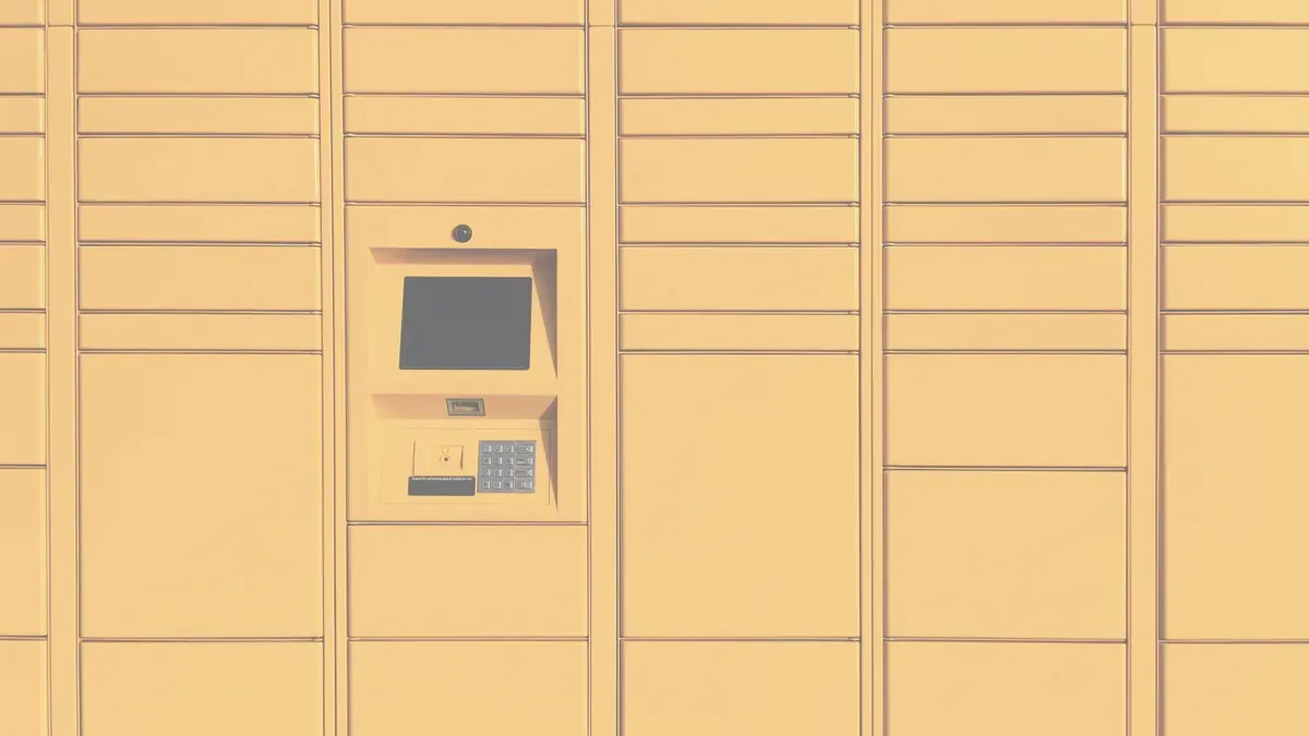 Paketautomat med numrerade fack och en skärm för att hämta ut paket